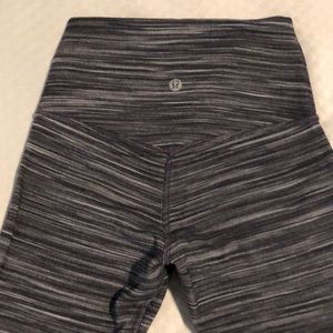 Lululemon, size 2, warm black and white leggings.